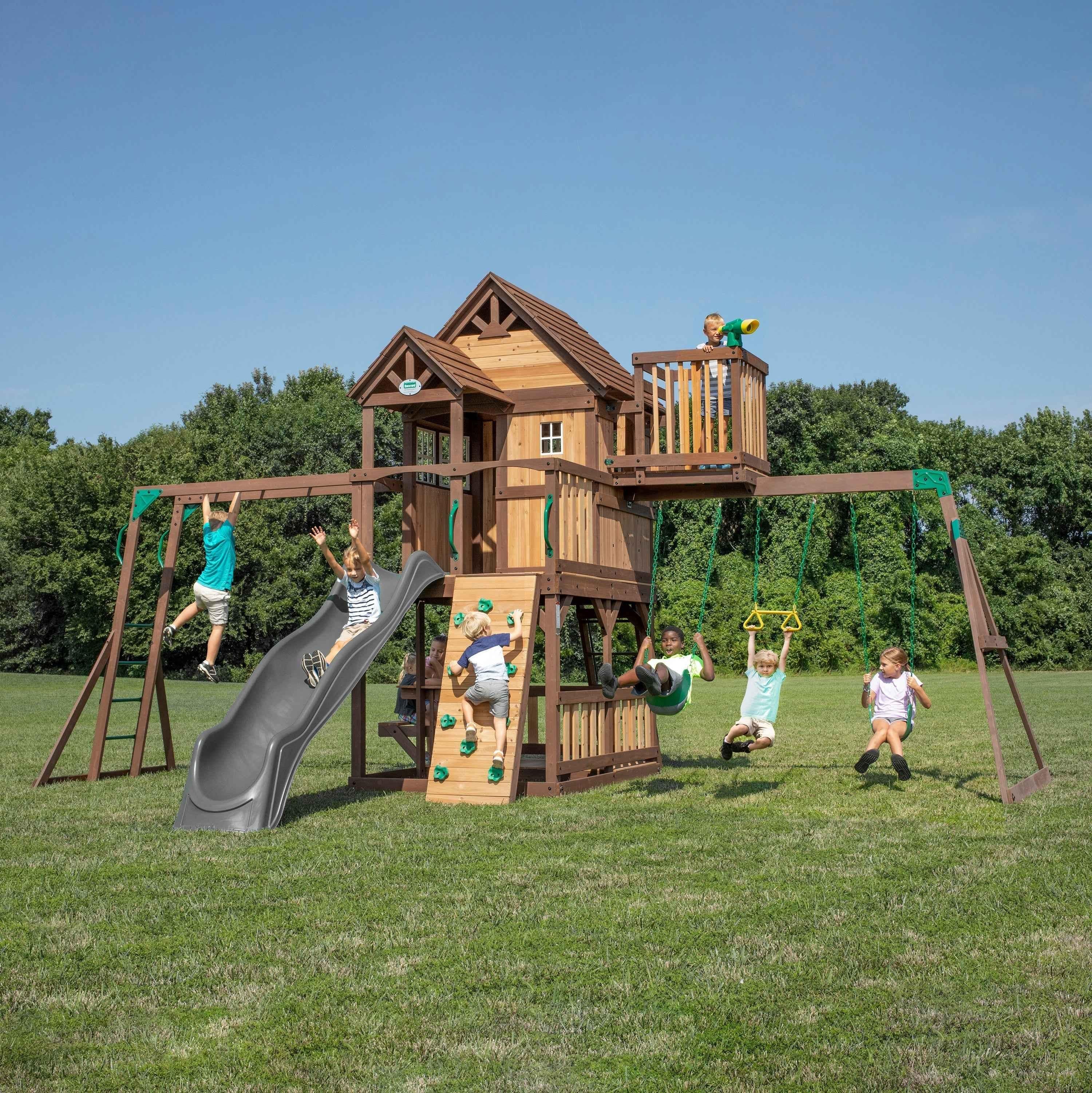 Backyard Discovery Skyfort II with Wave Slide.